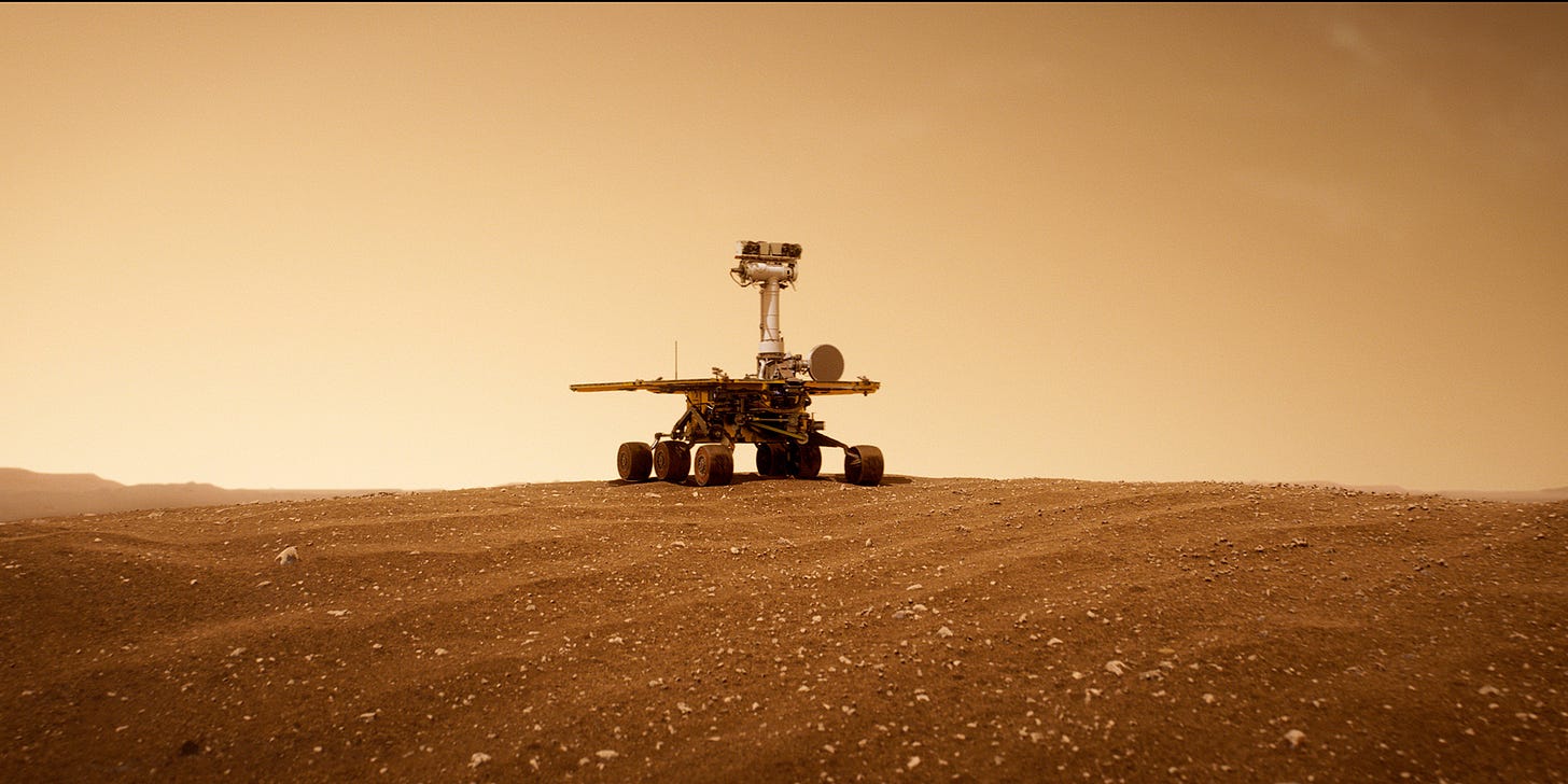 Still from GOOD NIGHT OPPY showing the Opportunity rover on Mars. Still from GOOD NIGHT OPPY showing the Opportunity rover on Mars.