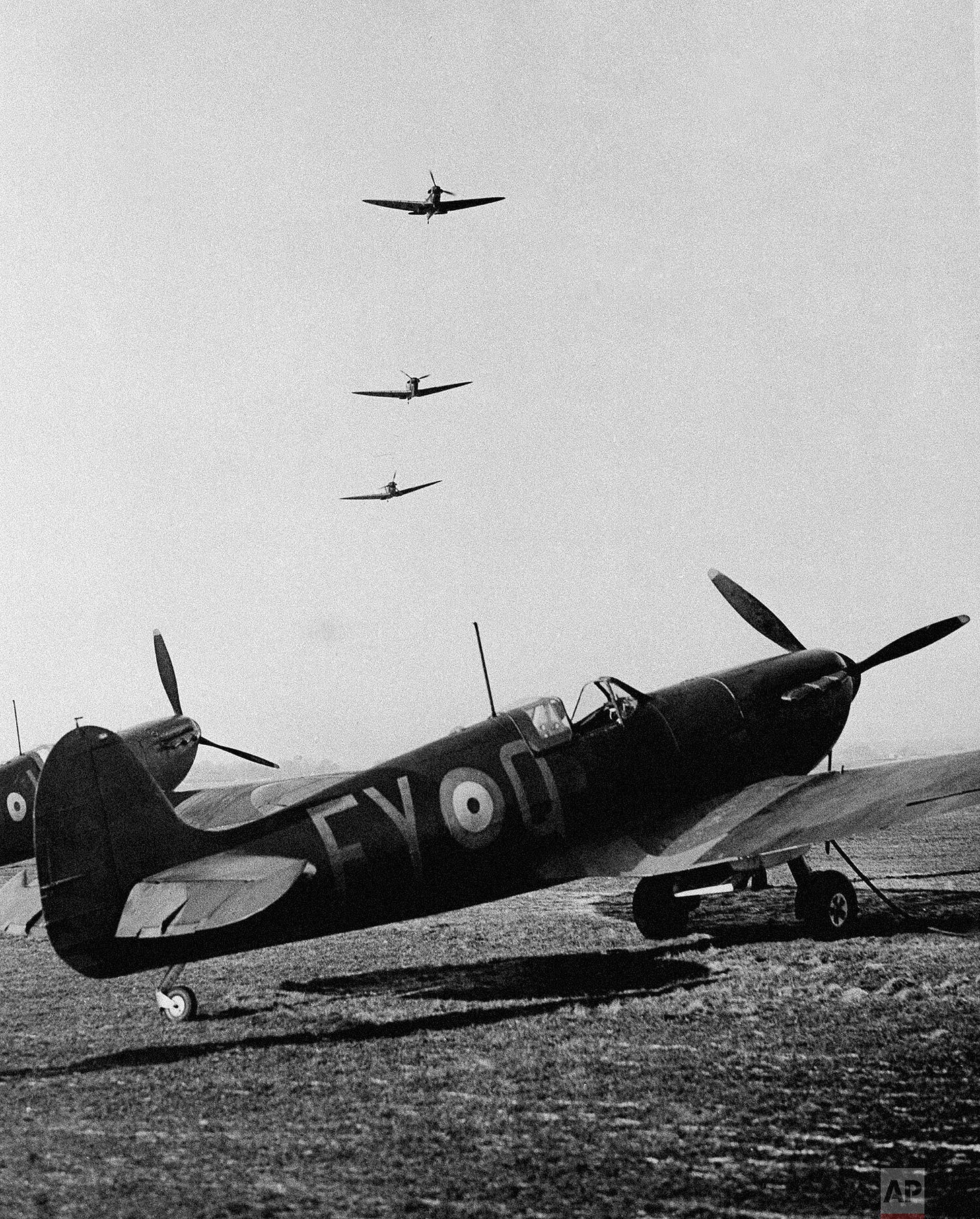 Five sleek Supermarine Spitfires ascend on January 24, 1940, responding to air-raid warnings to repel approaching enemy aircraft. These fast fighters were a symbol of British air superiority.
