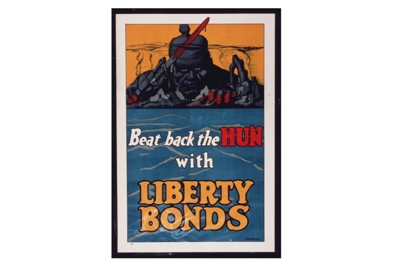 A First World War silk screened poster c1918 showing a frightening German soldier holding a bloodied bayonet. Caption reads: "Beat back the Hun with Liberty Bonds". (Photo by © CORBIS/Corbis via Getty Images)