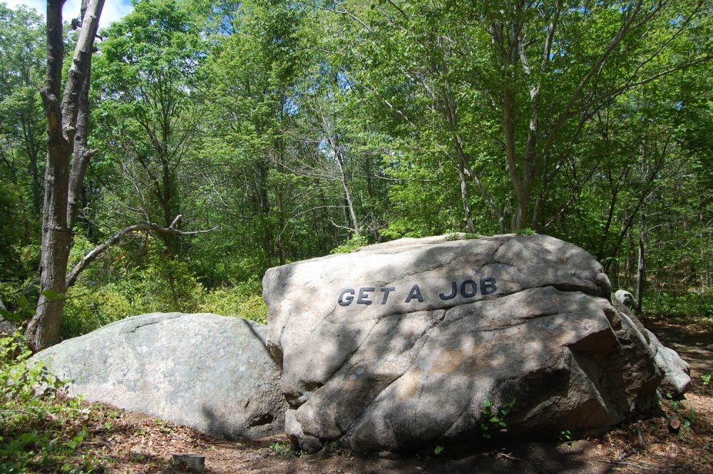 "Get a job" boulder in Gloucester's Dogtown woods. (Greg Cook/WBUR) "Get a job" boulder in Gloucester's Dogtown woods. (Greg Cook/WBUR)