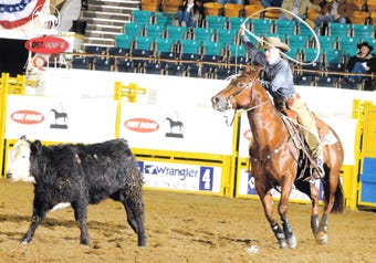Ranch-Horse-Cutting-white-horse-in-arena-with-other-horses