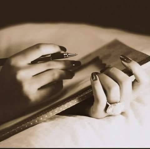 May be a black-and-white image of studying and diary May be a black-and-white image of studying and diary