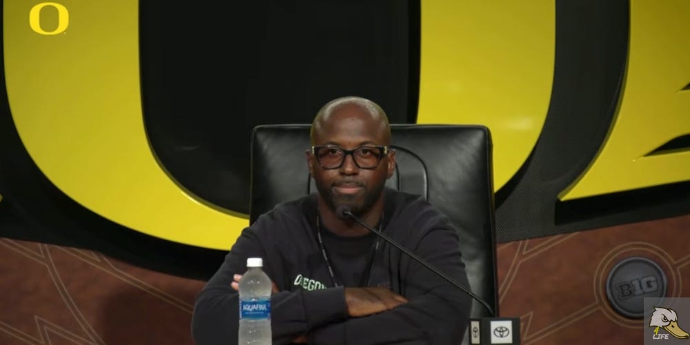 Hero image of Oregon Ducks DC Chris Hampton during recent press availability. Deals on seats, fan gear and premium Oregon Football coverage at www.Ducks4.Life