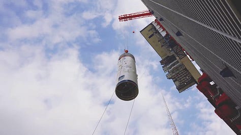 The Long March 2D 100th first-stage, second-stage, and fairing heading to and being placed onto Launch Complex 3.