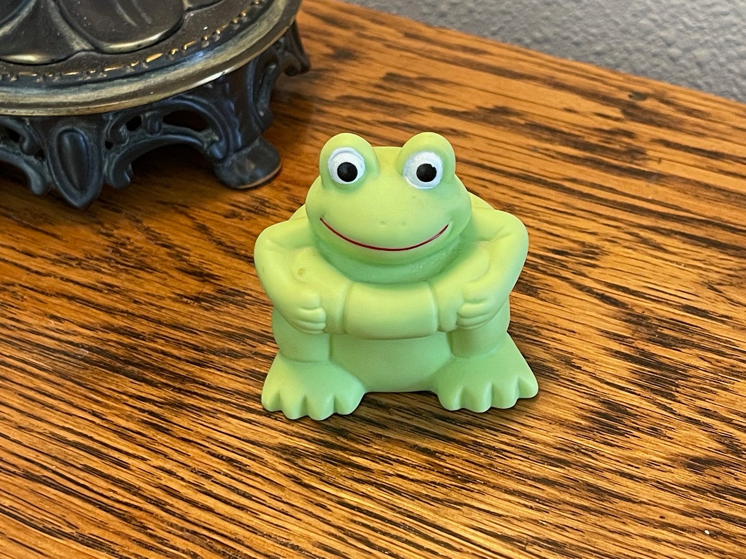 a bath-time squeaky-toy in the shape of a frog