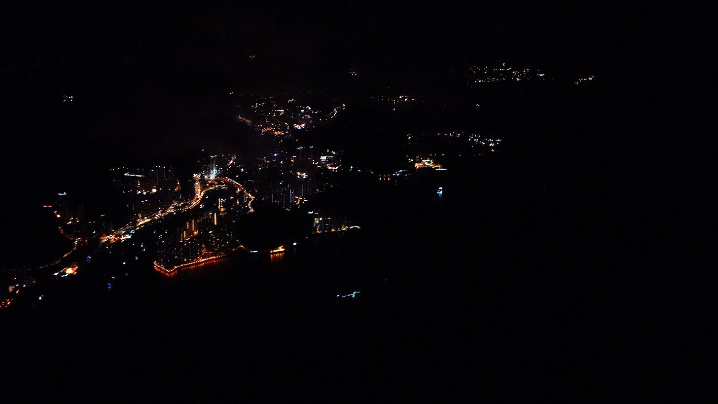 Shimmering lights of Hong Kong during the flight to Zurich Shimmering lights of Hong Kong during the flight to Zurich
