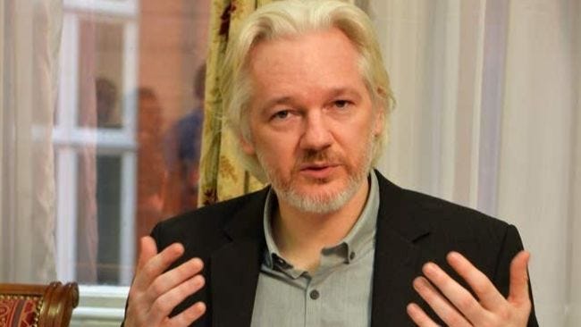 Julian Assange speaking during a press conference