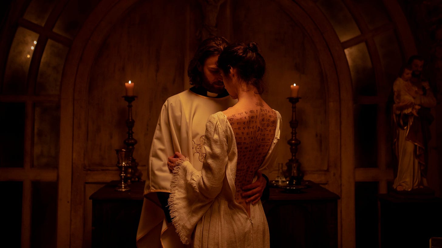 May be an image of 2 people and candle holder