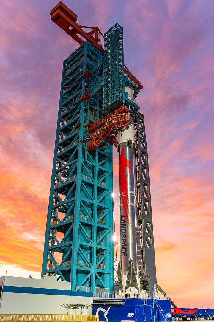 LandSpace's Zhuque-3 Y1 vehicle heading to the launch pad and recieving its payload fairing.