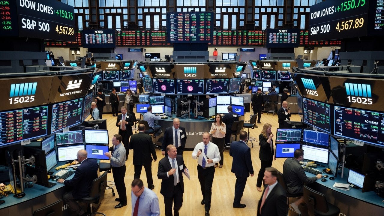 Busy New York Stock Exchange trading floor with brokers monitors and market data displays