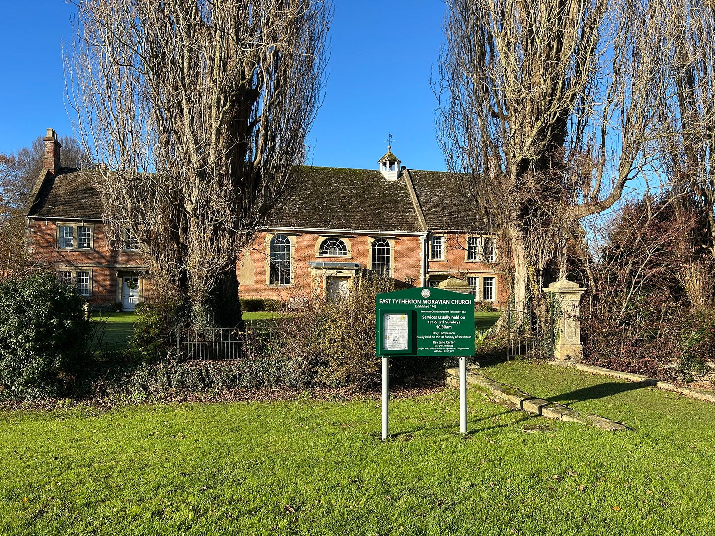 The Moravian Church and notice board in bright December sunshine. Photo: Roland Millward The Moravian Church and notice board in bright December sunshine. Photo: Roland Millward