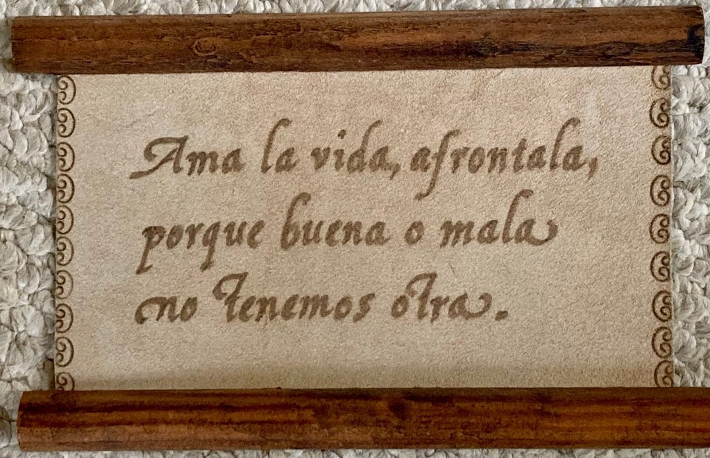A wooden plaque with writing on it

Description automatically generated
