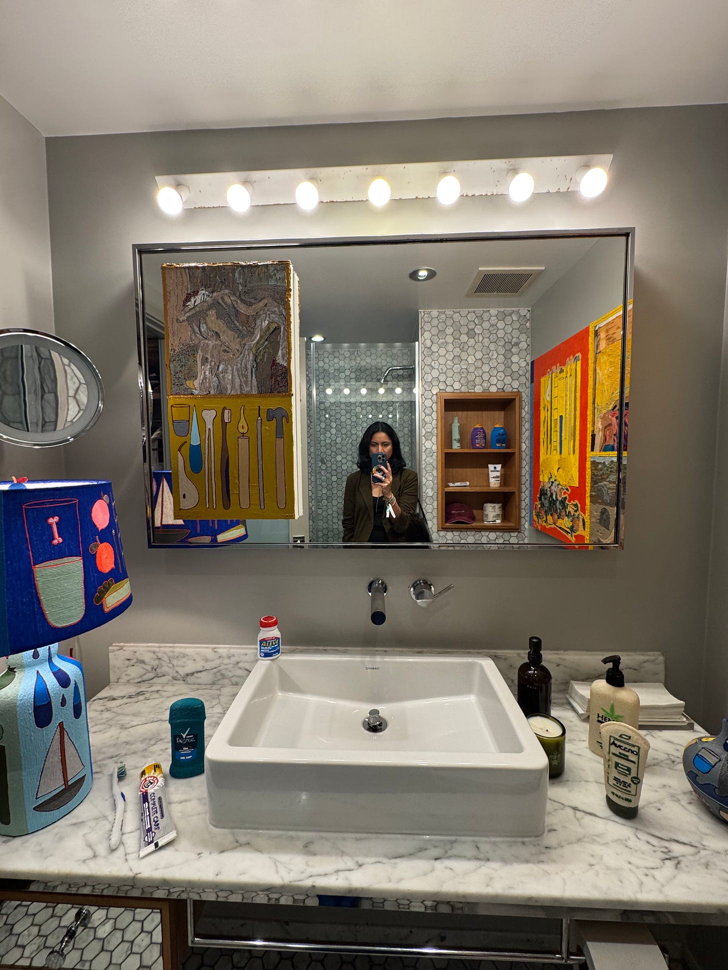 Felix Art Fair booth installation by Charles Hickey at Feia, with art and objects arranged throughout a Roosevelt Hotel room setting.