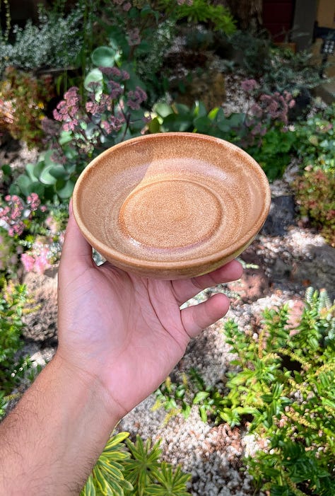 unfired clay bowl, glazed and finished bowl, bowl with food in it