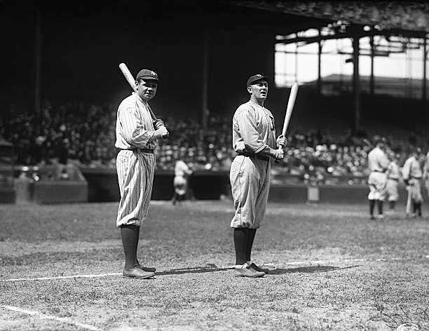 Babe Ruth and Ty Cobb pose with bats before a game in 1920. Babe Ruth and Ty Cobb pose with bats before a game in 1920.