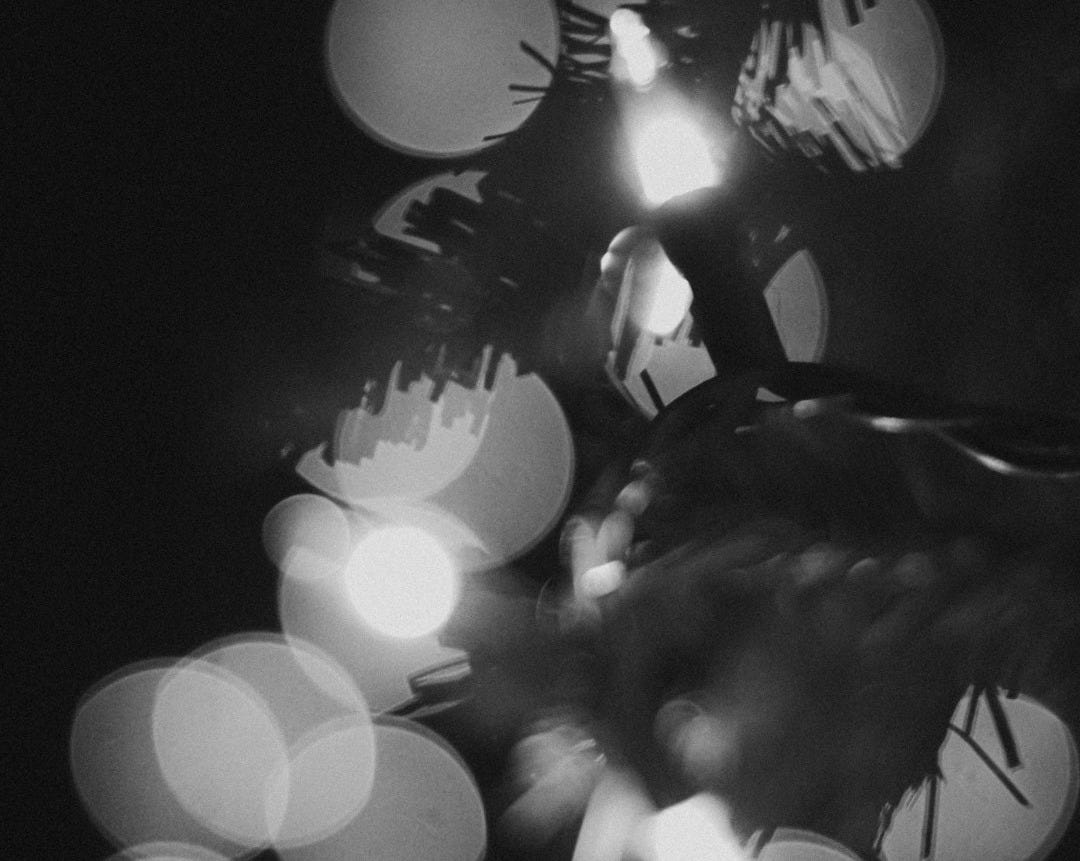 A black and white photo of a christmas tree