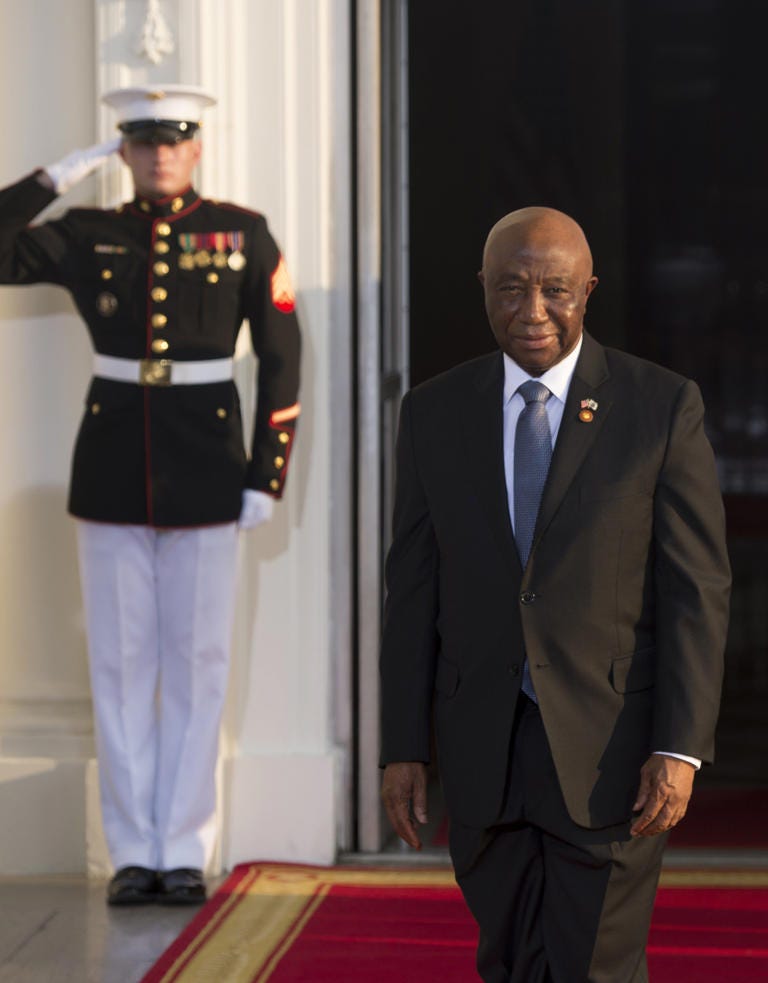Then-Liberian Vice President Joseph Nyuma Boakai arrives at the White House for a group dinner during the US Africa Leaders Summit August 5, 2014 in Washington, DC. Then-Liberian Vice President Joseph Nyuma Boakai arrives at the White House for a group dinner during the US Africa Leaders Summit August 5, 2014 in Washington, DC.