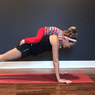 Toddler sitting on a mom doing pushups