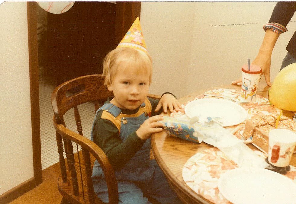 The author at childhood birthday The author at childhood birthday
