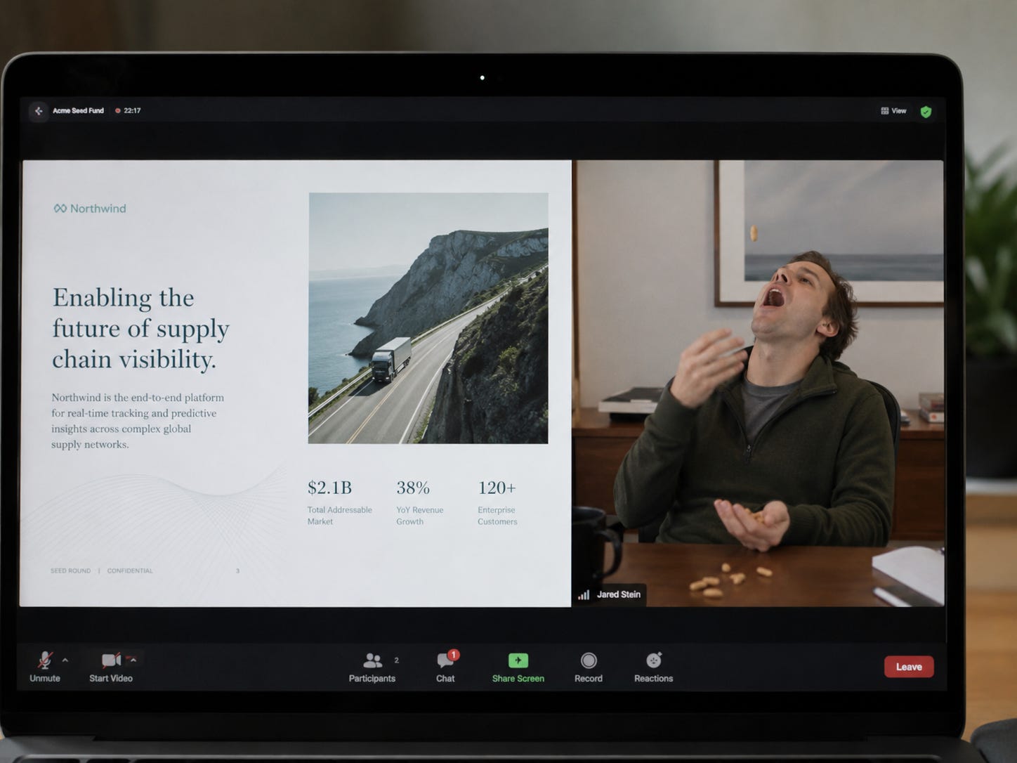 Investor tosses a peanut into his mouth during a Zoom call while a founder presents a startup pitch deck. Investor tosses a peanut into his mouth during a Zoom call while a founder presents a startup pitch deck.