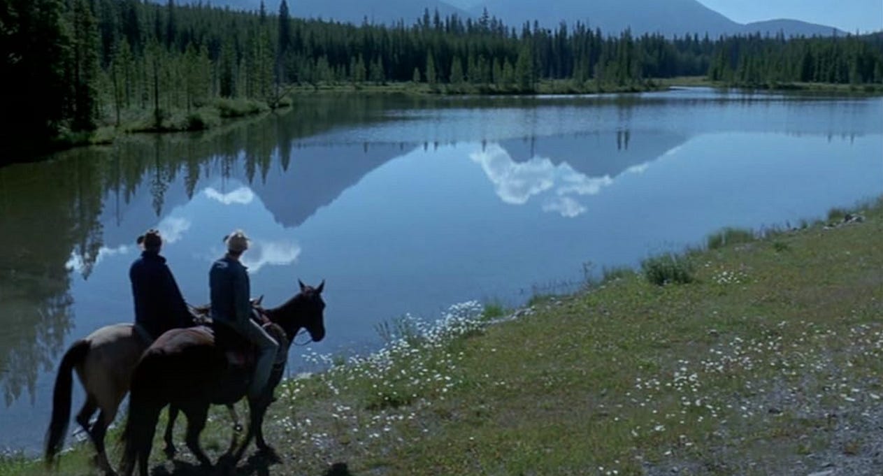The two protagonists of Brokeback Mountain on horseback beside a river / Focus Features The two protagonists of Brokeback Mountain on horseback beside a river / Focus Features