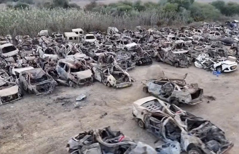 Destroyed cars in a field Destroyed cars in a field