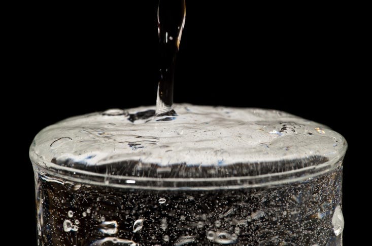A close-up of a glass of water

AI-generated content may be incorrect.