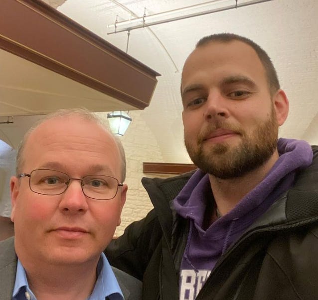 A photograph of State Senator Brenner and DJ Byrnes, the author of The Rooster