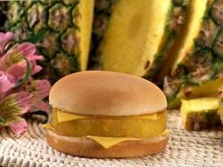 A cheeseburger with pineapple slices

AI-generated content may be incorrect.
