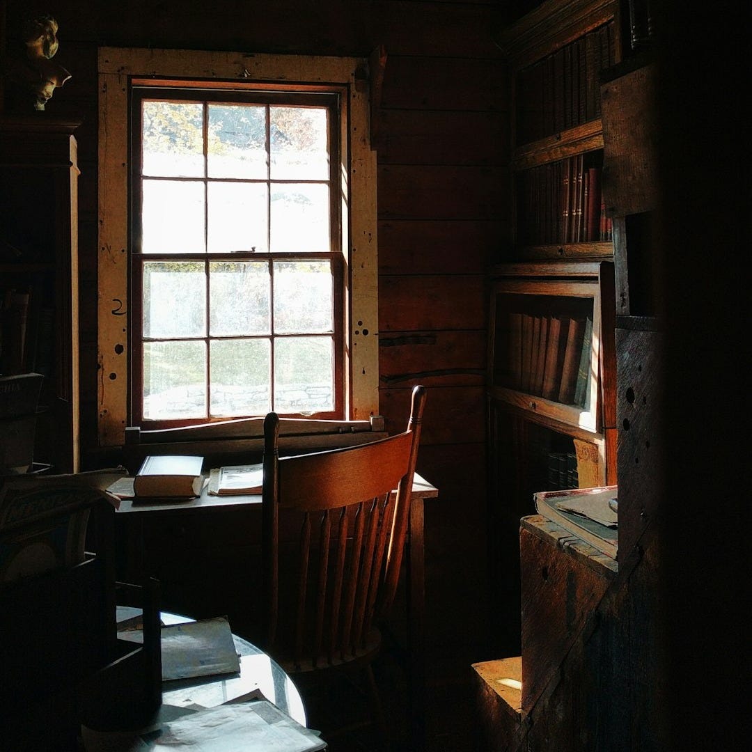 brown wooden chair beside brown wooden table