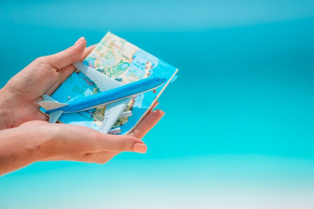 Closeup of map and model airplane background the sea Closeup of map and model airplane background the sea