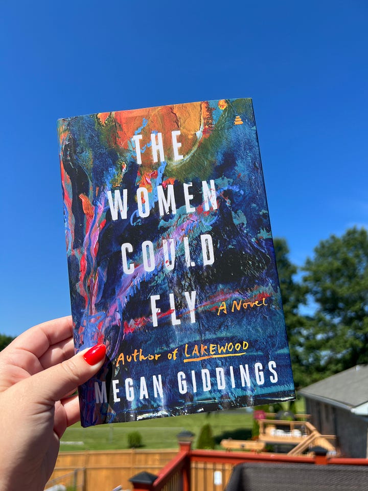 Left: A hand holding the book The Women Could Fly outside on a bright day, with a blue sky in background. Right: a hand holding a copy of Hey, Hun in front of packed bookshelves.
