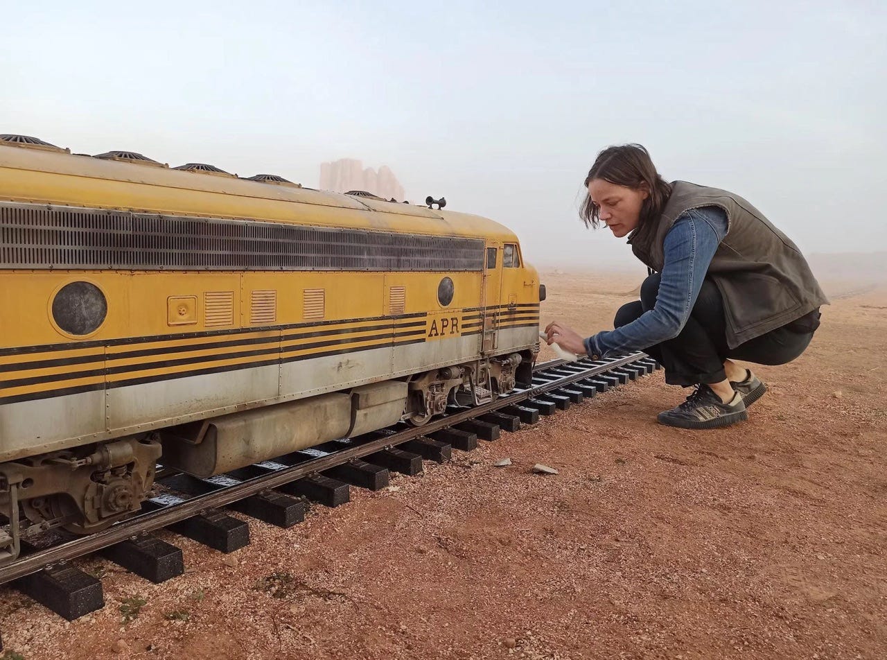 Wes Anderson near a miniature train for 'Asteroid City'