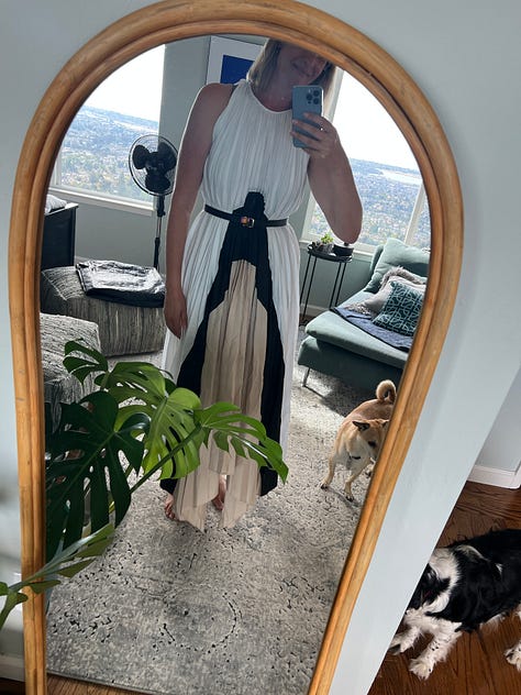 A gallery of images of the author modeling new items she's gotten from Rent the Runway.