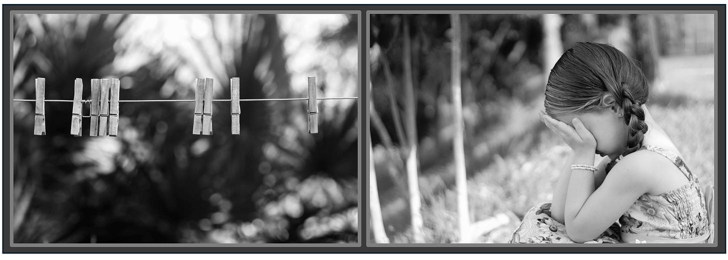 Clothespins on a line; sad little girl