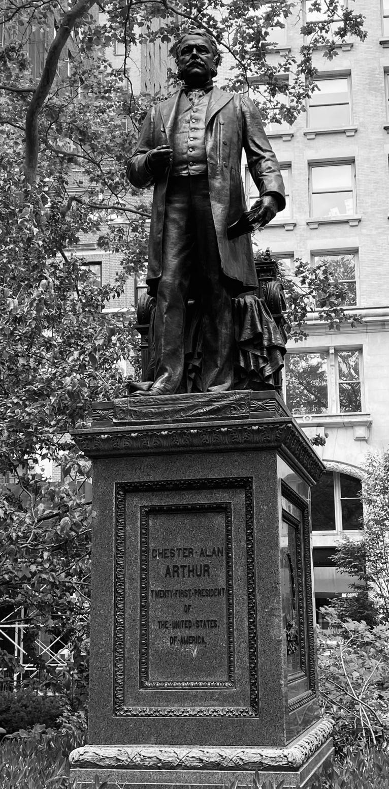 A statue of a person in a park

AI-generated content may be incorrect.