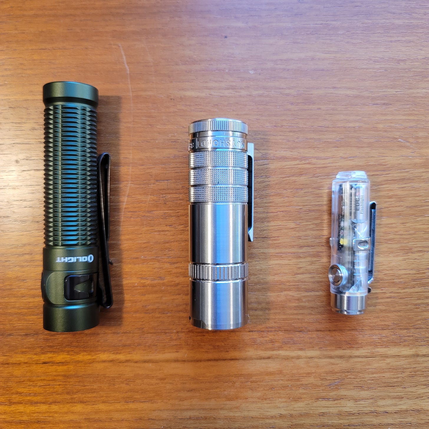 Olight Baton Pro Max, Muyshondt Beagle, and RovyVon Aurora A8 Flashlights.