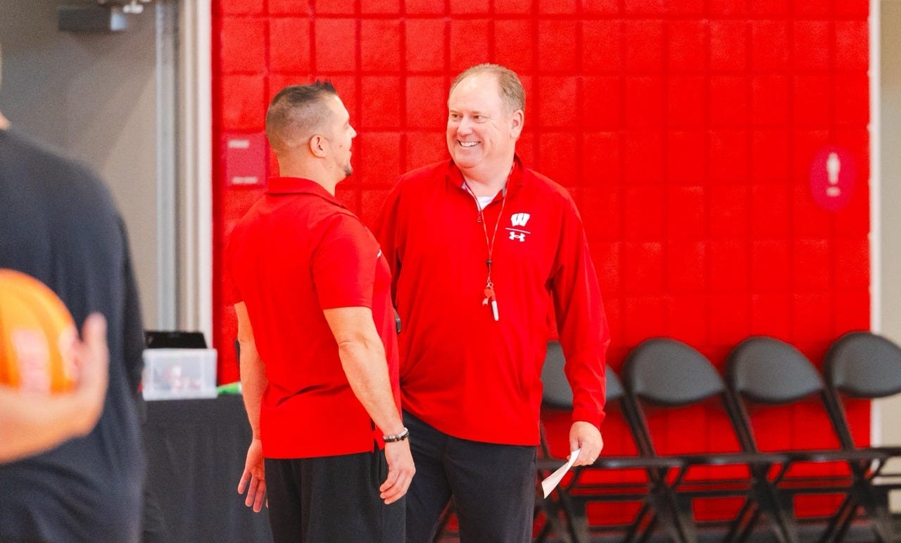 Wisconsin men’s basketball coach Greg Gard talks with an assistant coach during an open practice. Wisconsin men’s basketball coach Greg Gard talks with an assistant coach during an open practice.