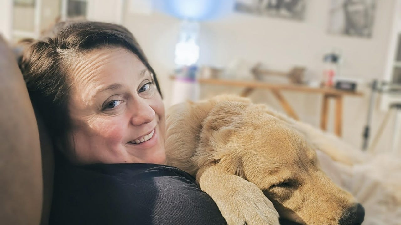 Kristi Turner and Hamilton, a Certified Therapy Dog