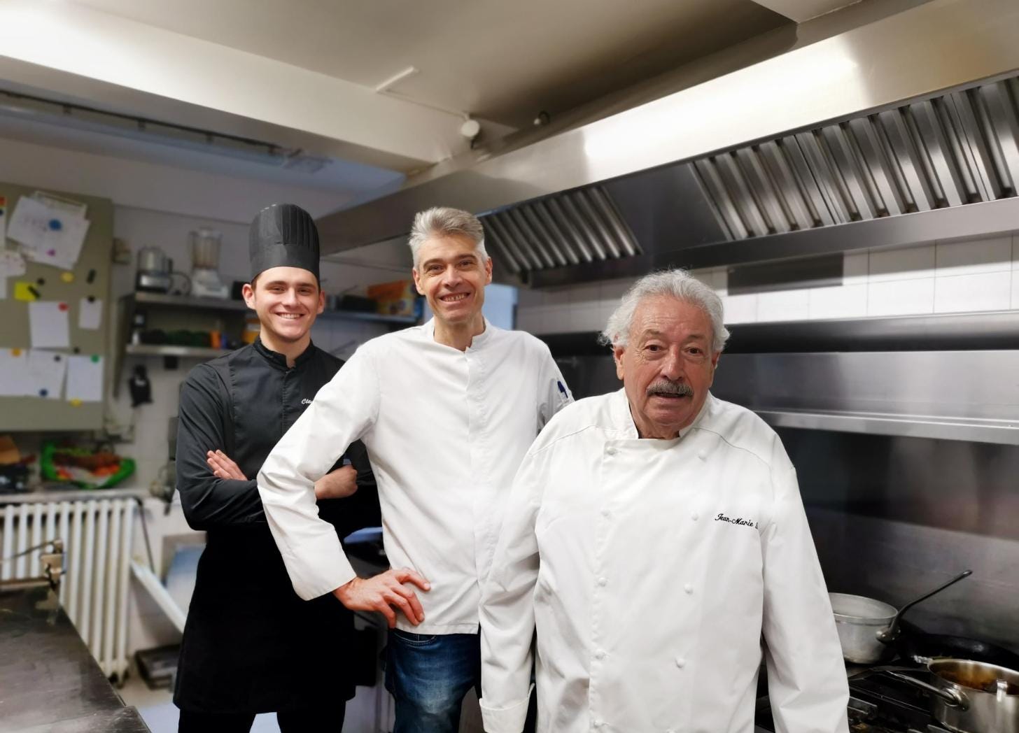 Three generations of the Bain family in the kitchen. Clément, Arnaud, and Jean-Marie — the tenth, ninth, and eighth generation. Three generations of the Bain family in the kitchen. Clément, Arnaud, and Jean-Marie — the tenth, ninth, and eighth generation.