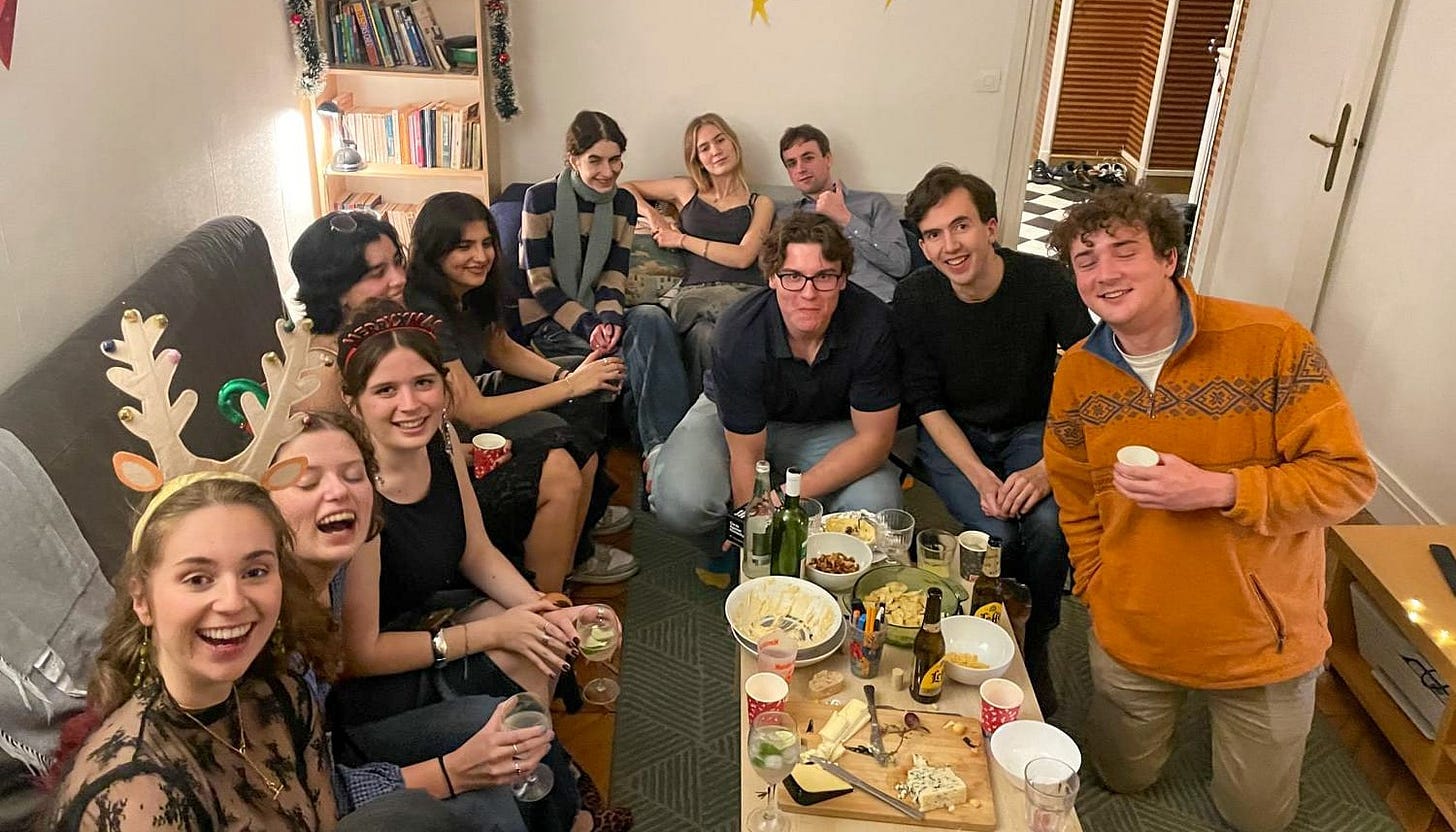 Friends gather for a photo at a Christmas party