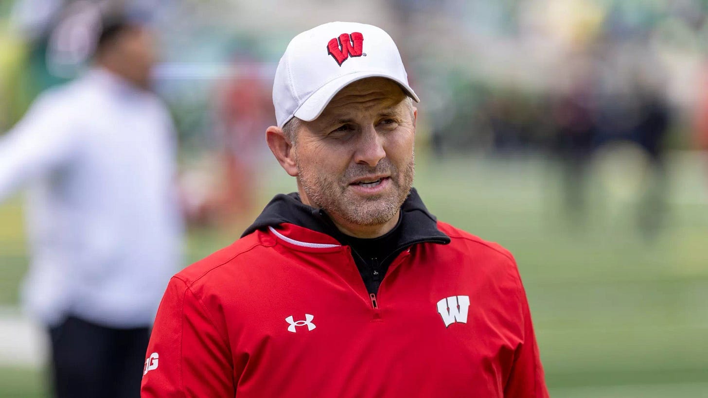 Wisconsin Badgers defensive coordinator Mike Tressel walks on the field. Photo credit: UW Athletics.