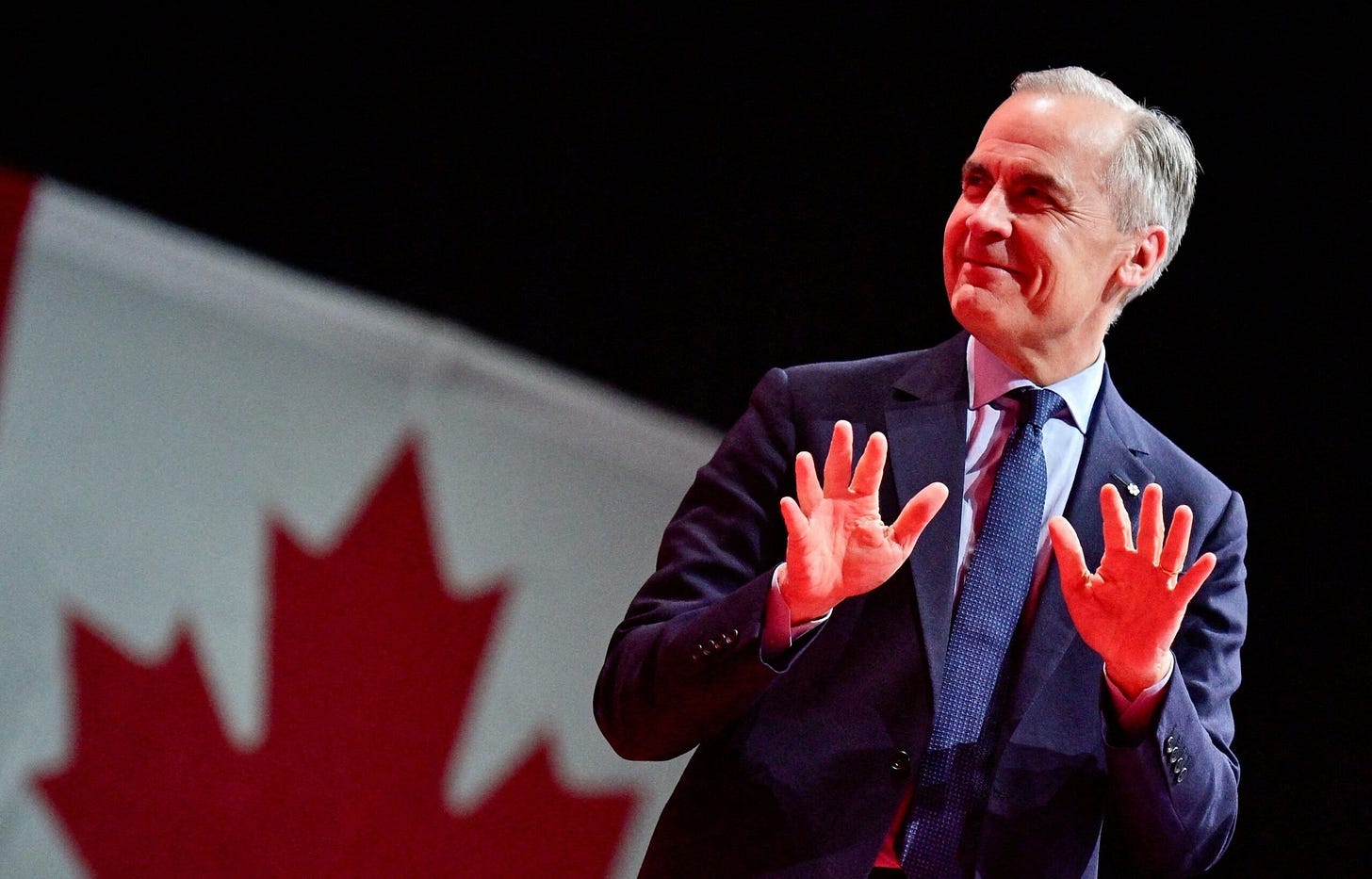 After historic win, Canadian prime minister pledges unity