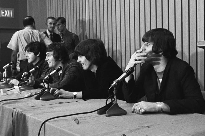Paul McCartney (left), John Lennon, George Harrison and Ringo Starr at press conference between two performances at Portland's Memorial Coliseum on Aug. 22, 1965.