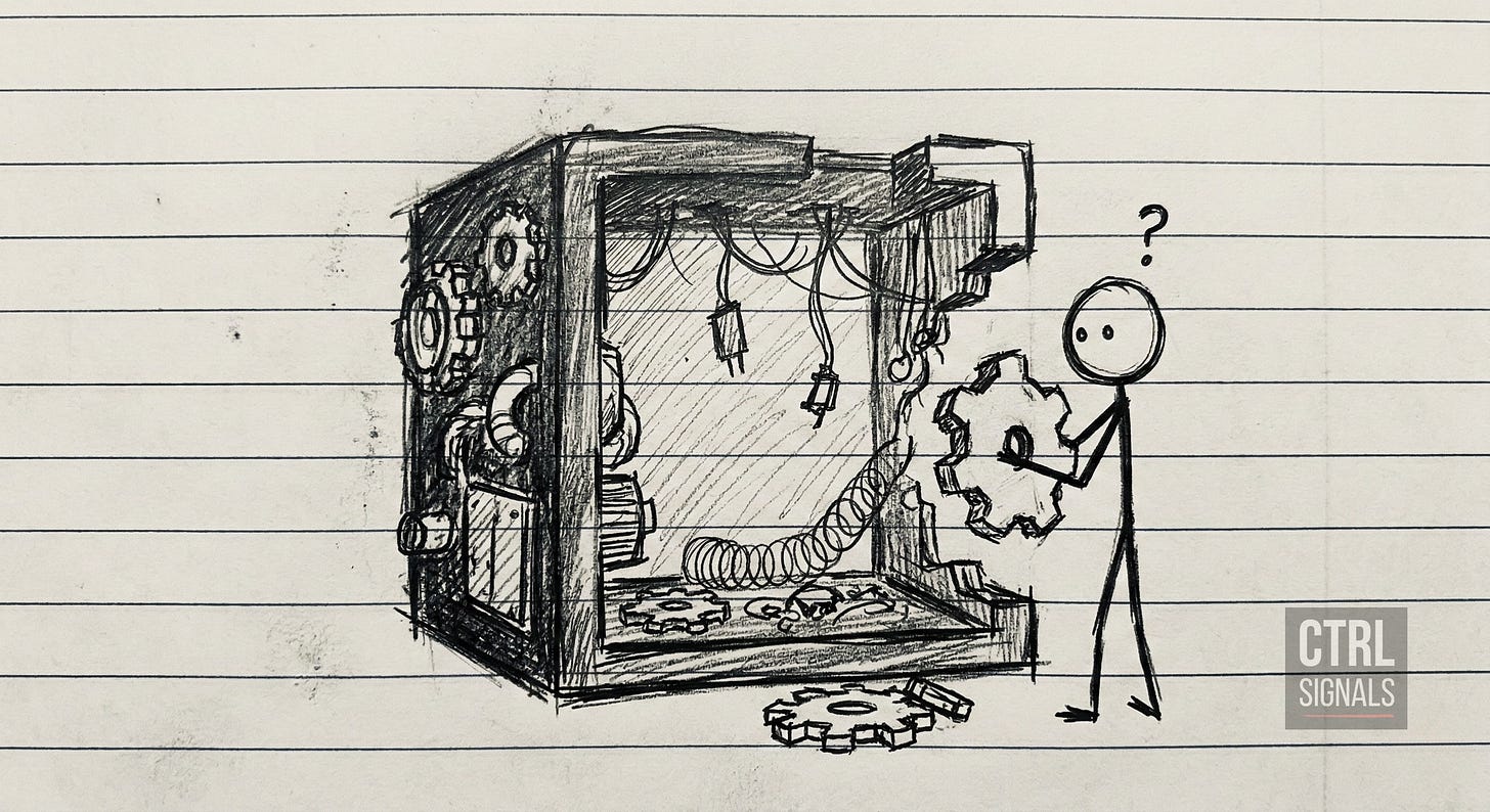 Hand-drawn stick figure holding a gear while looking at an incomplete machine with a missing part and exposed wires, sketched on lined notebook paper.