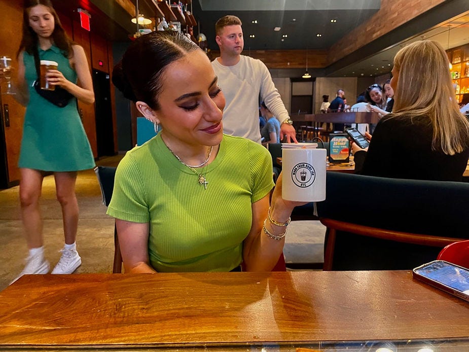 Christina Kremidas with WFHishNYC mug