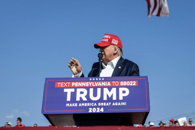 A person speaking into a microphone

AI-generated content may be incorrect.