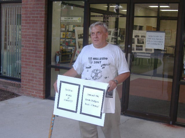 This gentleman wanted both Bush and Cheney impeached. The Vietnam veteran was handing out a cartoon mocking Bush for not having served in Vietnam. This gentleman wanted both Bush and Cheney impeached. The Vietnam veteran was handing out a cartoon mocking Bush for not having served in Vietnam.