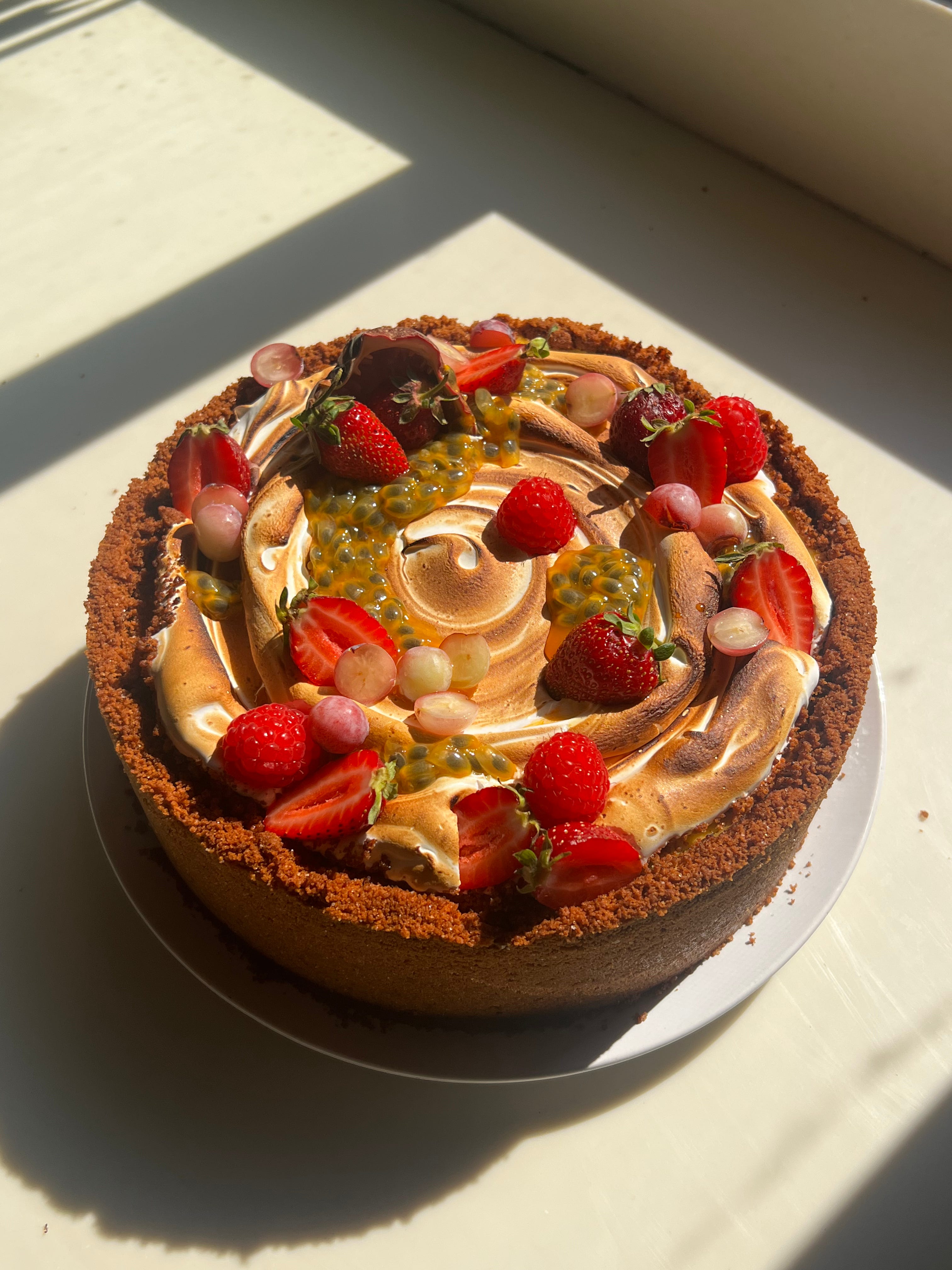 passion fruit goat cheesecake - by Kassie Mendieta