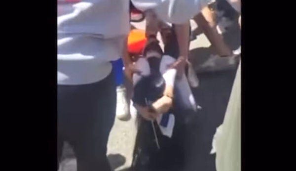 A Jewish girl is pummeled on the campus of UCLA on Tuesday, April 30, 2024. (Video screenshot) A Jewish girl is pummeled on the campus of UCLA on Tuesday, April 30, 2024. (Video screenshot)